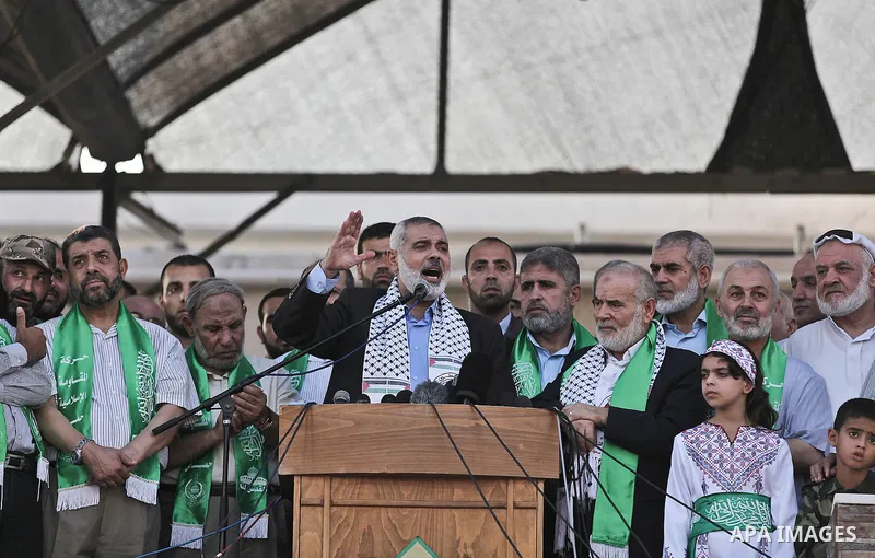 Palestinian top Hamas leader in Gaza, Ismail Haniyeh, gives a speech during a rally in Gaza City, Wednesday, Aug. 27, 2014. An open-ended cease-fire between Israel and Palestinian militants in the Gaza Strip was holding...