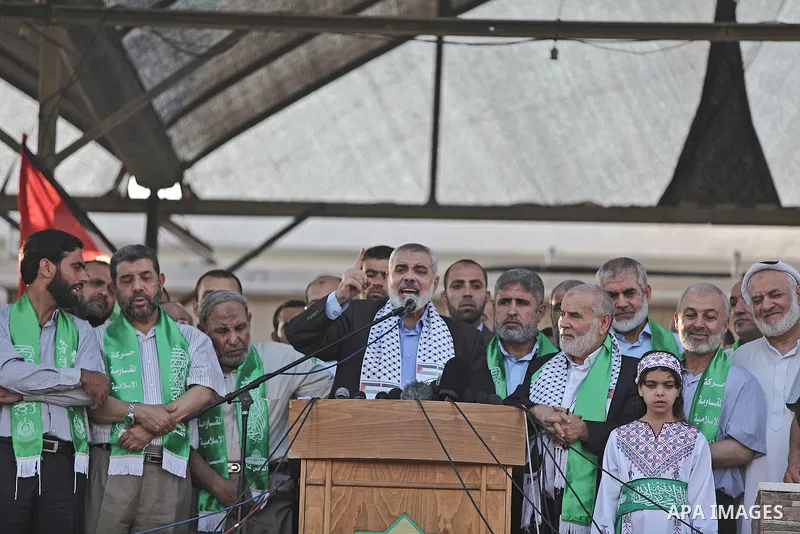 Palestinian top Hamas leader in Gaza, Ismail Haniyeh, gives a speech during a rally in Gaza City, Wednesday, Aug. 27, 2014. An open-ended cease-fire between Israel and Palestinian militants in the Gaza Strip was holding...
