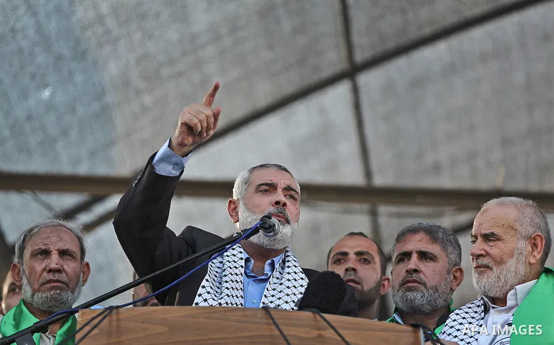 Palestinian top Hamas leader in Gaza, Ismail Haniyeh, gives a speech during a rally in Gaza City, Wednesday, Aug. 27, 2014. An open-ended cease-fire between Israel and Palestinian militants in the Gaza Strip was holding...