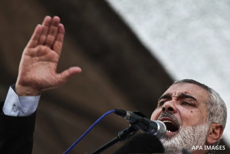 Palestinian top Hamas leader in Gaza, Ismail Haniyeh, gives a speech during a rally in Gaza City, Wednesday, Aug. 27, 2014. An open-ended cease-fire between Israel and Palestinian militants in the Gaza Strip was holding...