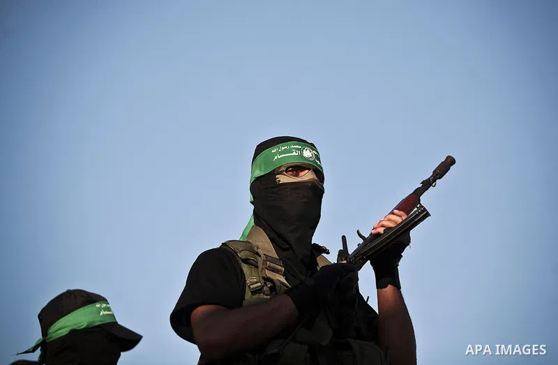 Palestinian militants from the Ezzedine al-Qassam Brigades, Hamas' armed wing, attend a rally in Gaza City on August 27, 2014, following a deal hailed by Israel and the Islamist movement as 'victory' in the 50-day war. T...