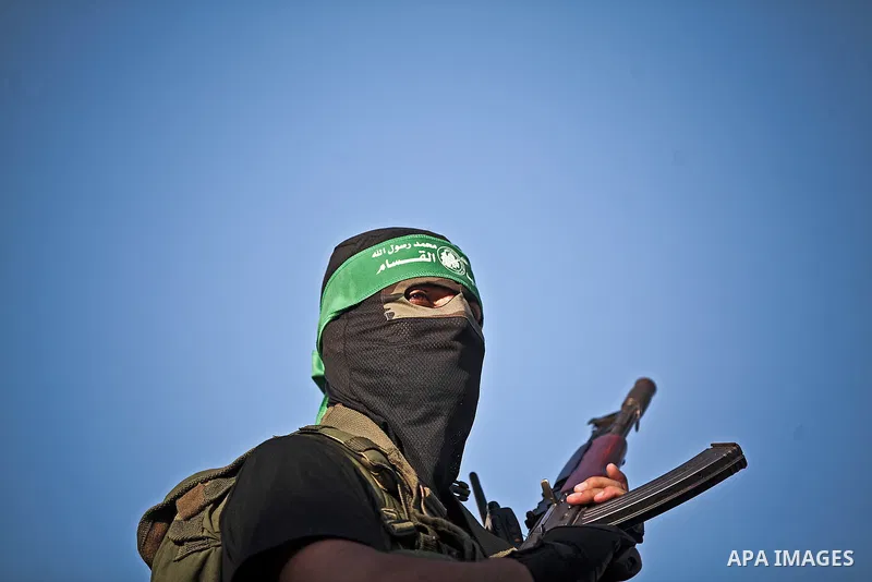 Palestinian militants from the Ezzedine al-Qassam Brigades, Hamas' armed wing, attend a rally in Gaza City on August 27, 2014, following a deal hailed by Israel and the Islamist movement as 'victory' in the 50-day war. T...