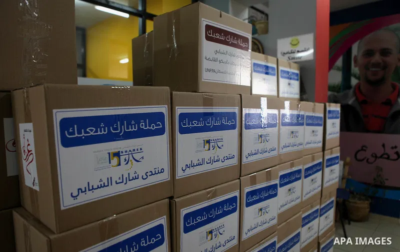 Palestinians collect human supplies to be sent to the stricken in the Gaza Strip in the West Bank city of Ramallah on August 28, 2014. Israel and Palestinians both boasted of victory in the Gaza war but analysts say Hama...