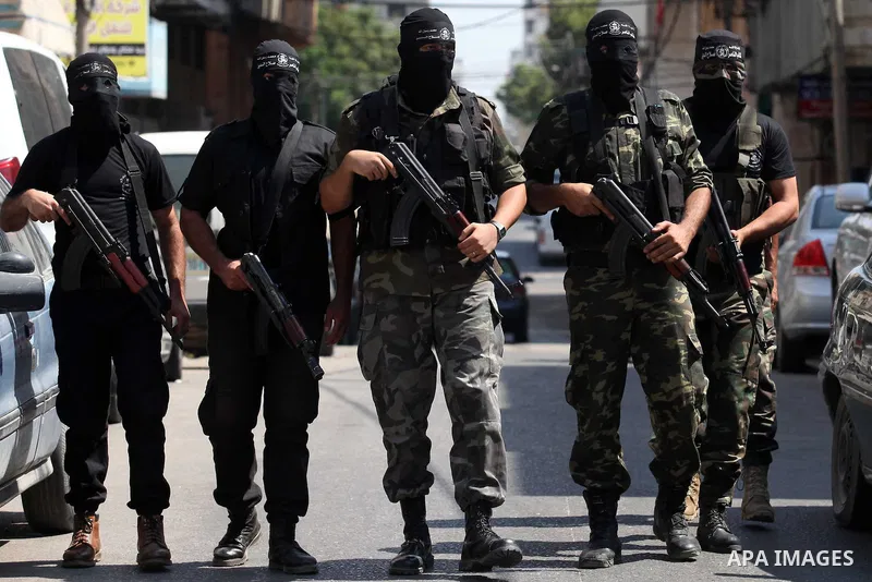 Palestinian Militants from al-Nasser Salah el dein brigades attend a press conference in Gaza city on August 28, 2014. An open-ended ceasefire in the Gaza war held on Wednesday as Prime Minister Benjamin Netanyahu faced...