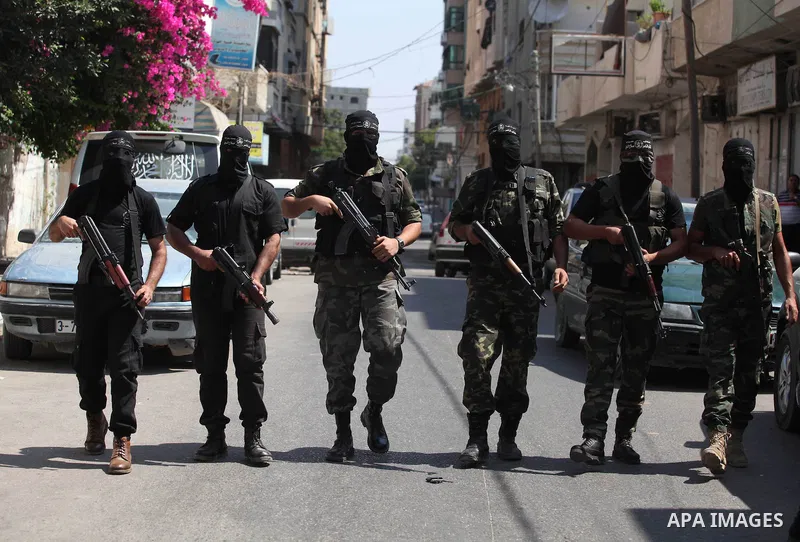 Palestinian Militants from al-Nasser Salah el dein brigades attend a press conference in Gaza city on August 28, 2014. An open-ended ceasefire in the Gaza war held on Wednesday as Prime Minister Benjamin Netanyahu faced...