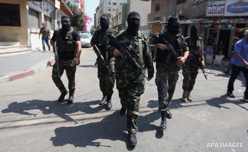 Palestinian Militants from al-Nasser Salah el dein brigades attend a press conference in Gaza city on August 28, 2014. An open-ended ceasefire in the Gaza war held on Wednesday as Prime Minister Benjamin Netanyahu faced...