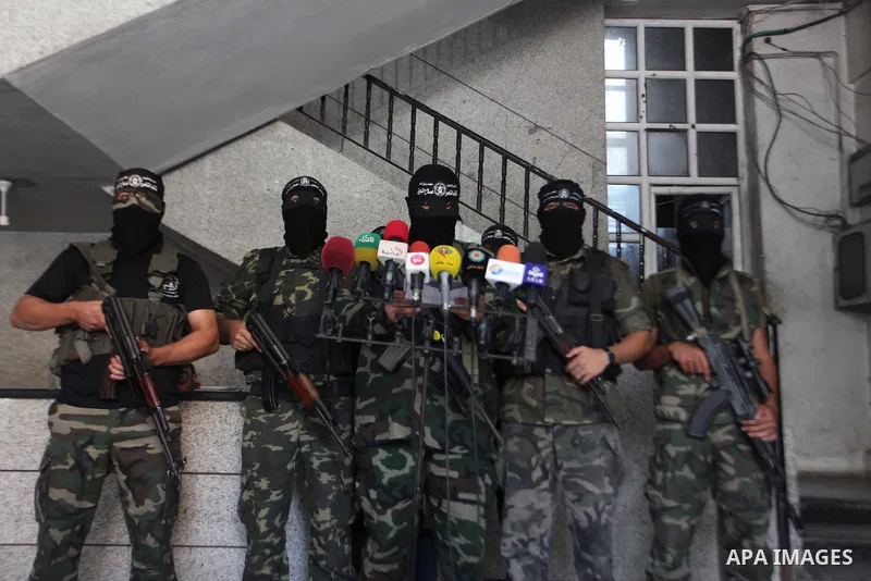 Palestinian Militants from al-Nasser Salah el dein brigades attend a press conference in Gaza city on August 28, 2014. An open-ended ceasefire in the Gaza war held on Wednesday as Prime Minister Benjamin Netanyahu faced...