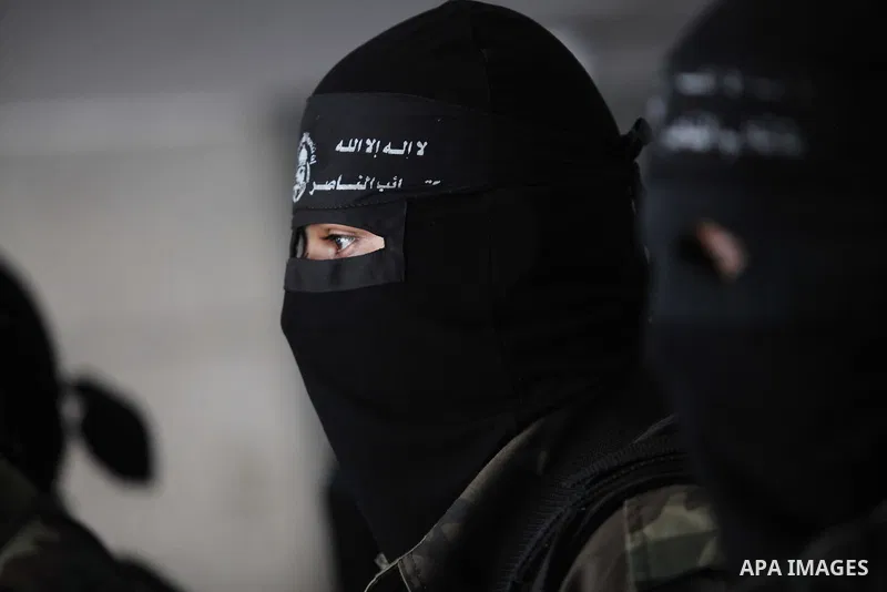 A Palestinian Militant from al-Nasser Salah el dein brigades attends a press conference in Gaza city on August 28, 2014. An open-ended ceasefire in the Gaza war held on Wednesday as Prime Minister Benjamin Netanyahu face...