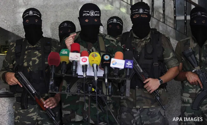 Palestinian Militants from al-Nasser Salah el dein brigades attend a press conference in Gaza city on August 28, 2014. An open-ended ceasefire in the Gaza war held on Wednesday as Prime Minister Benjamin Netanyahu faced...