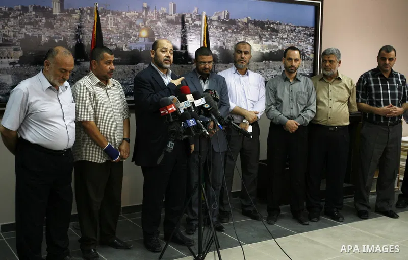 Senior Hamas official, Moussa Abu Marzouk speaks to media in Rafah crossing in the southern Gaza strip after the negotiations in Cairo, on August 28, 2014. An open-ended ceasefire in the Gaza war held on Wednesday as Pri...