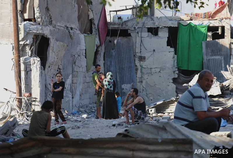 Palestinians return to their houses in Shejaiya neighborhood after a ceasefire was declared, in Gaza city on August 28, 2014. Israel and Palestinians both boasted of victory in the Gaza war but analysts say Hamas receive...