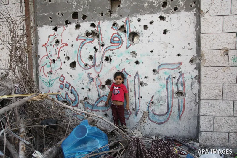 Palestinians return to their houses in Shejaiya neighborhood after a ceasefire was declared, in Gaza city on August 28, 2014. Israel and Palestinians both boasted of victory in the Gaza war but analysts say Hamas receive...