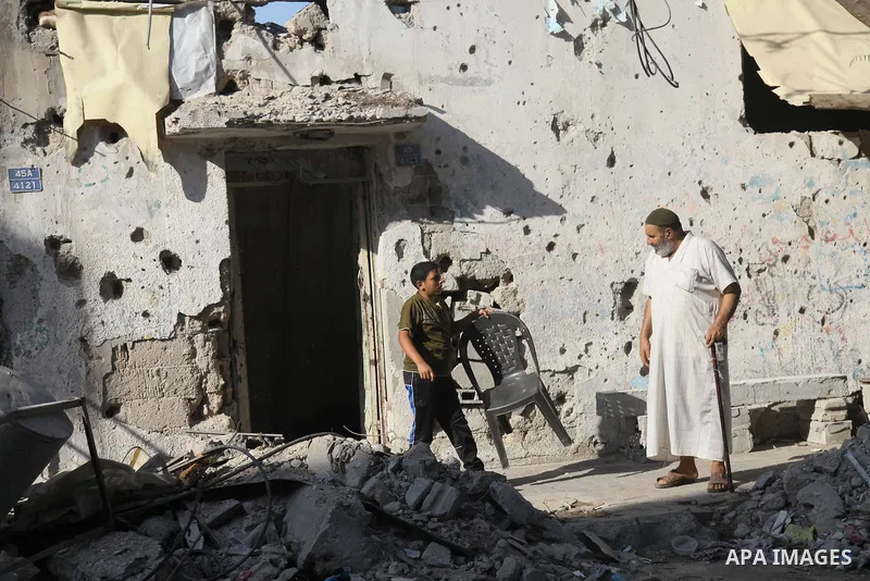 Palestinians return to their houses in Shejaiya neighborhood after a ceasefire was declared, in Gaza city on August 28, 2014. Israel and Palestinians both boasted of victory in the Gaza war but analysts say Hamas receive...