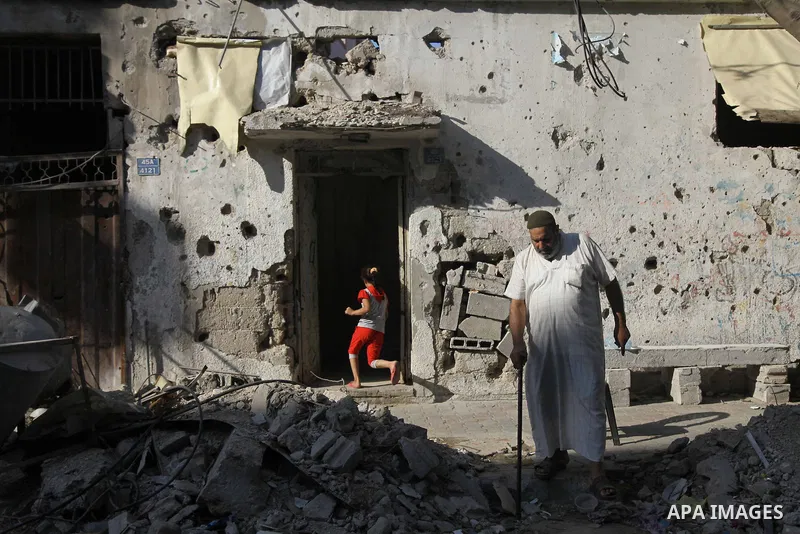 Palestinians return to their houses in Shejaiya neighborhood after a ceasefire was declared, in Gaza city on August 28, 2014. Israel and Palestinians both boasted of victory in the Gaza war but analysts say Hamas receive...