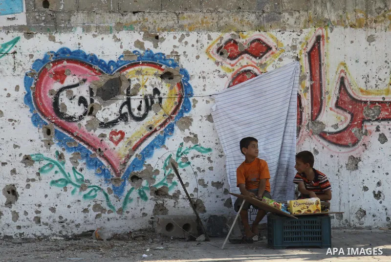 Palestinians return to their houses in Shejaiya neighborhood after a ceasefire was declared, in Gaza city on August 28, 2014. Israel and Palestinians both boasted of victory in the Gaza war but analysts say Hamas receive...