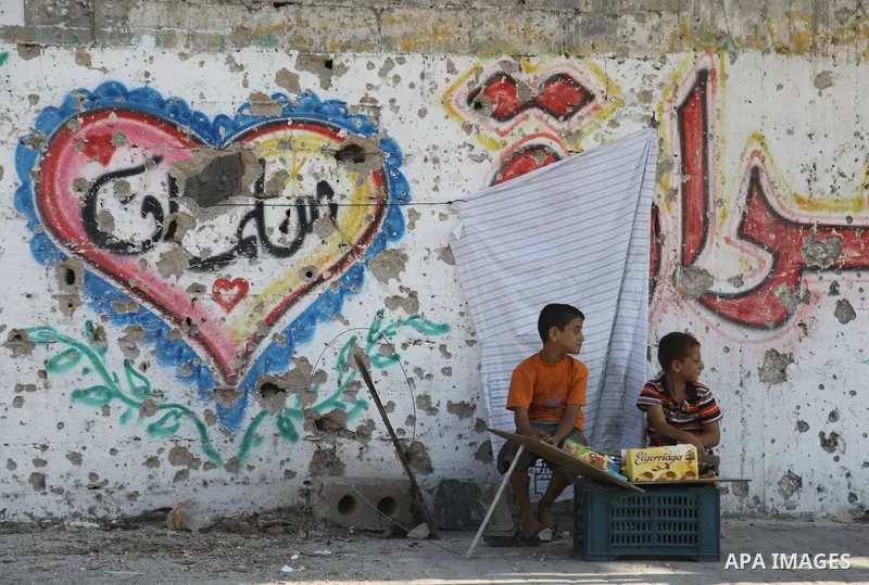 Palestinians return to their houses in Shejaiya neighborhood after a ceasefire was declared, in Gaza city on August 28, 2014. Israel and Palestinians both boasted of victory in the Gaza war but analysts say Hamas receive...