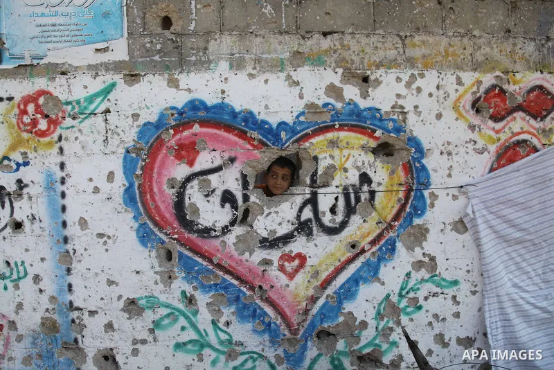 Palestinians return to their houses in Shejaiya neighborhood after a ceasefire was declared, in Gaza city on August 28, 2014. Israel and Palestinians both boasted of victory in the Gaza war but analysts say Hamas receive...