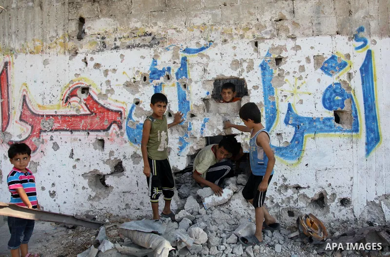 Palestinians return to their houses in Shejaiya neighborhood after a ceasefire was declared, in Gaza city on August 28, 2014. Israel and Palestinians both boasted of victory in the Gaza war but analysts say Hamas receive...