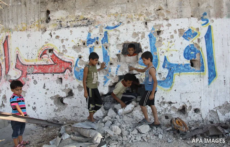 Palestinians return to their houses in Shejaiya neighborhood after a ceasefire was declared, in Gaza city on August 28, 2014. Israel and Palestinians both boasted of victory in the Gaza war but analysts say Hamas receive...