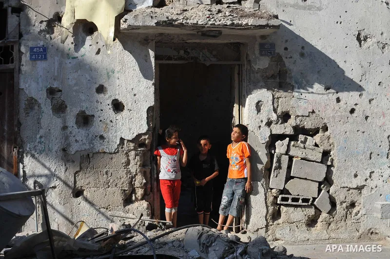 Palestinians return to their houses in Shejaiya neighborhood after a ceasefire was declared, in Gaza city on August 28, 2014. Israel and Palestinians both boasted of victory in the Gaza war but analysts say Hamas receive...