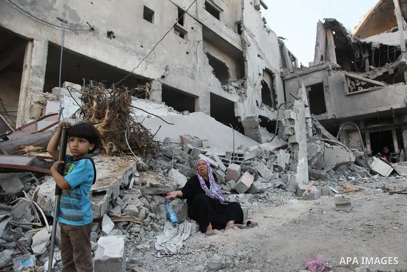 Palestinians return to their houses in Beit Hanoun after a ceasefire was declared, in northern Gaza strip on August 28, 2014. Israel and Palestinians both boasted of victory in the Gaza war but analysts say Hamas receive...
