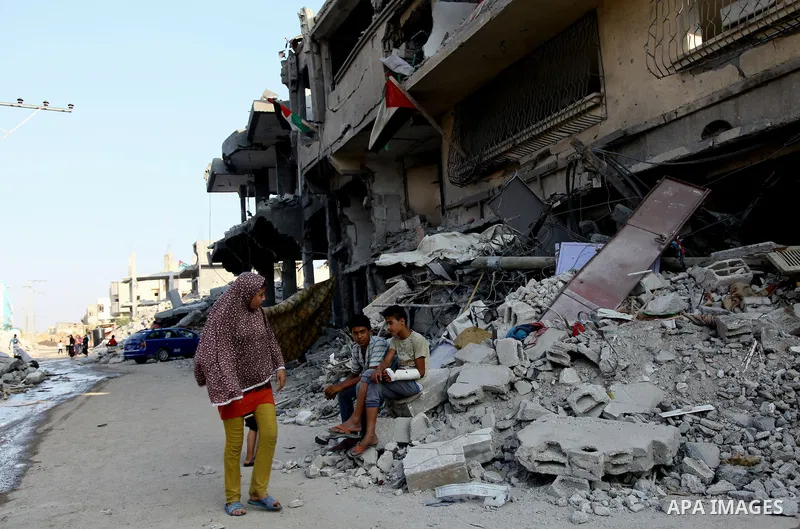 Palestinians return to their houses in Beit Hanoun after a ceasefire was declared, in northern Gaza strip on August 28, 2014. Israel and Palestinians both boasted of victory in the Gaza war but analysts say Hamas receive...