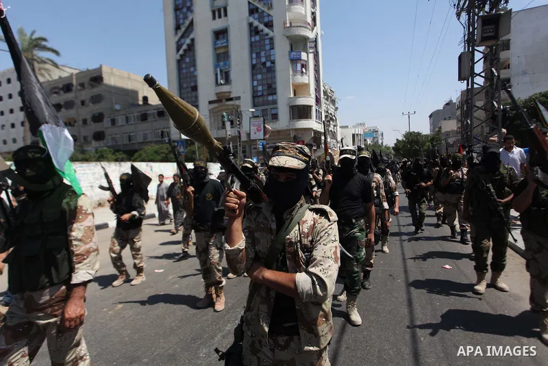 Palestinian Islamic Jihad militants take part in a rally celebrating what they say was a victory over Israel following a ceasefire in Gaza City August 29, 2014. An open-ended ceasefire, mediated by Egypt, took effect on...