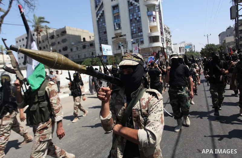 Palestinian Islamic Jihad militants take part in a rally celebrating what they say was a victory over Israel following a ceasefire in Gaza City August 29, 2014. An open-ended ceasefire, mediated by Egypt, took effect on...