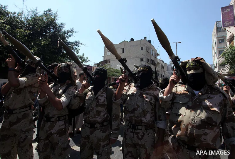 Palestinian Islamic Jihad militants take part in a rally celebrating what they say was a victory over Israel following a ceasefire in Gaza City August 29, 2014. An open-ended ceasefire, mediated by Egypt, took effect on...
