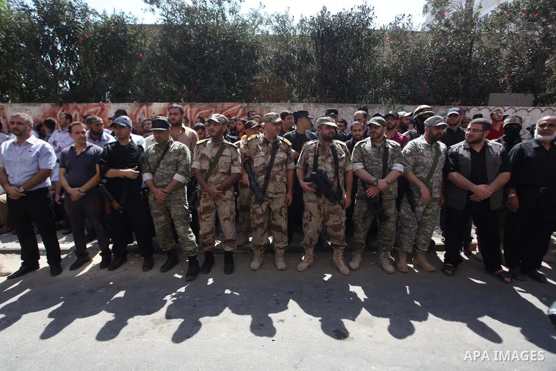 Leaders of the Al-Quds Brigades, the armed wing of the Islamic Jihad movement, participating in a military parade, what they say was a victory over Israel following a ceasefire in Gaza City August 29, 2014. An open-ended...
