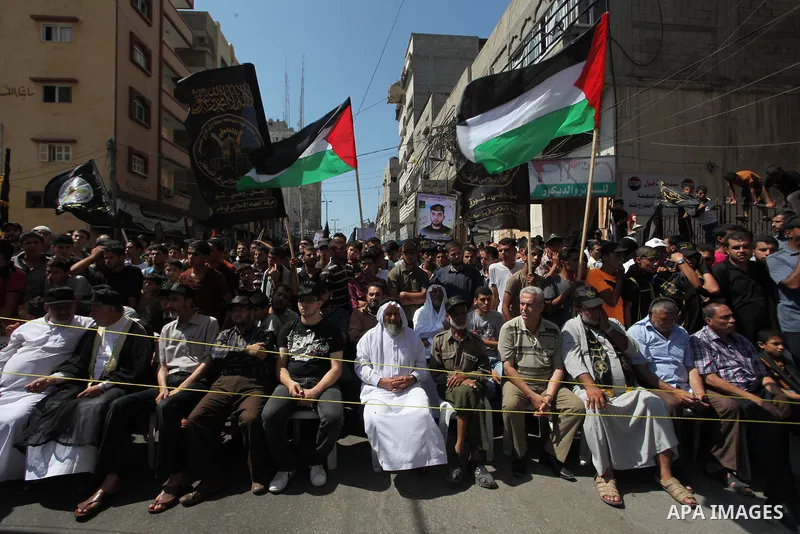 Leaders of the Al-Quds Brigades, the armed wing of the Islamic Jihad movement, participating in a military parade, what they say was a victory over Israel following a ceasefire in Gaza City August 29, 2014. An open-ended...