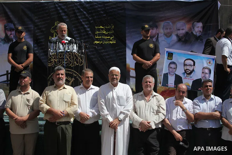 Leaders of the Al-Quds Brigades, the armed wing of the Islamic Jihad movement, participating in a military parade, what they say was a victory over Israel following a ceasefire in Gaza City August 29, 2014. An open-ended...