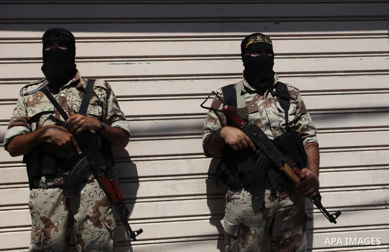 Palestinian Islamic Jihad militants take part in a rally celebrating what they say was a victory over Israel following a ceasefire in Gaza City August 29, 2014. An open-ended ceasefire, mediated by Egypt, took effect on...