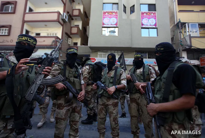 Palestinian Islamic Jihad militants take part in a rally celebrating what they say was a victory over Israel following a ceasefire in Gaza City August 29, 2014. An open-ended ceasefire, mediated by Egypt, took effect on...