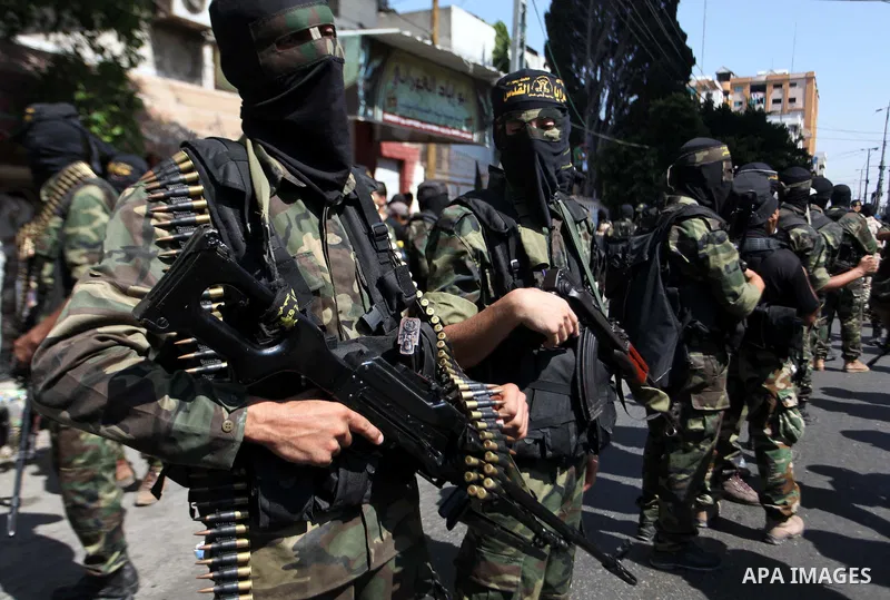 Palestinian Islamic Jihad militants take part in a rally celebrating what they say was a victory over Israel following a ceasefire in Gaza City August 29, 2014. An open-ended ceasefire, mediated by Egypt, took effect on...