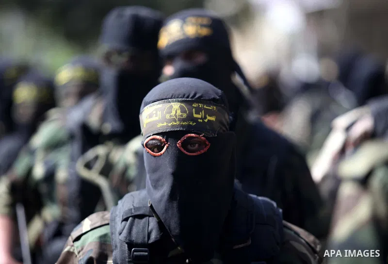 Palestinian Islamic Jihad militants take part in a rally celebrating what they say was a victory over Israel following a ceasefire in Gaza City August 29, 2014. An open-ended ceasefire, mediated by Egypt, took effect on...