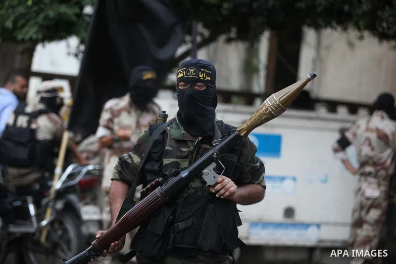 Palestinian Islamic Jihad militants take part in a rally celebrating what they say was a victory over Israel following a ceasefire in Gaza City August 29, 2014. An open-ended ceasefire, mediated by Egypt, took effect on...