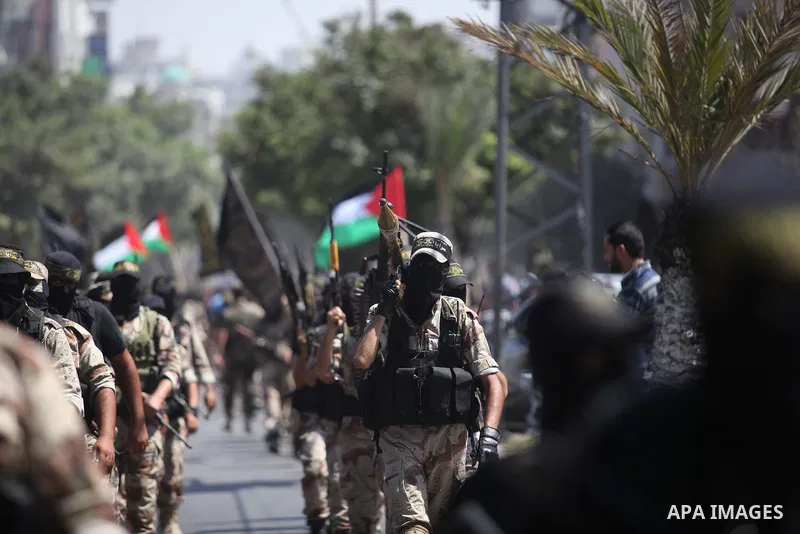 Palestinian Islamic Jihad supporters celebrate with people what they said was a victory over Israel, in Gaza City August 29, 2014. An open-ended ceasefire, mediated by Egypt, took effect on Tuesday evening. It called for...