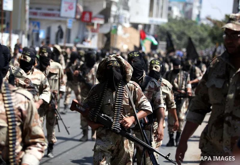 Palestinian Islamic Jihad supporters celebrate with people what they said was a victory over Israel, in Gaza City August 29, 2014. An open-ended ceasefire, mediated by Egypt, took effect on Tuesday evening. It called for...