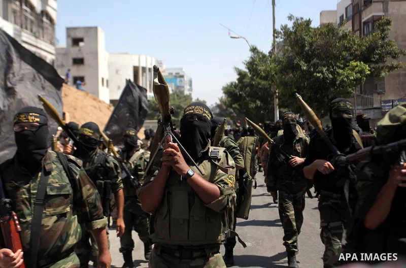 Palestinian Islamic Jihad supporters celebrate with people what they said was a victory over Israel, in Gaza City August 29, 2014. An open-ended ceasefire, mediated by Egypt, took effect on Tuesday evening. It called for...