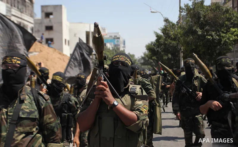 Palestinian Islamic Jihad supporters celebrate with people what they said was a victory over Israel, in Gaza City August 29, 2014. An open-ended ceasefire, mediated by Egypt, took effect on Tuesday evening. It called for...
