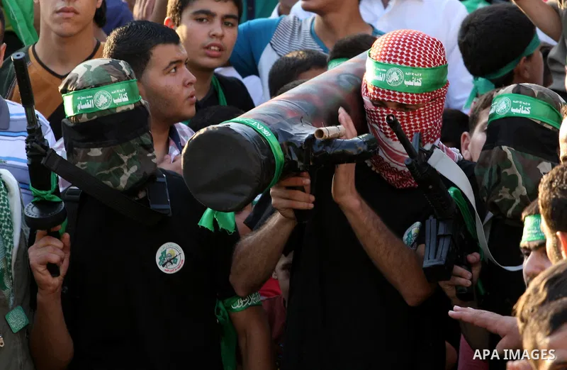 Palestinians who support the Islamic Hamas movement take part in a rally showing their support and solidarity with Hamas in the West Bank city of Nablus, 29 August 2014. An open-ended ceasefire, mediated by Egypt, took e...