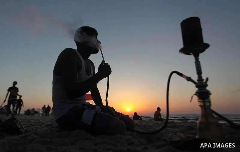 Palestinians play in the Mediterranean Sea off the coast of Gaza City August 29, 2014, days after a ceasefire was reached. An open-ended ceasefire, mediated by Egypt, took effect on Tuesday evening. It called for an inde...