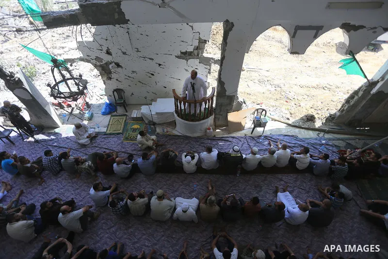 Senior Hamas leader Khalil al-Hayya attends Friday prayers at the remains of a mosque, which witnesses said was hit by an Israeli air strike during a seven-week Israeli offensive in Gaza City August 29, 2014. An open-end...