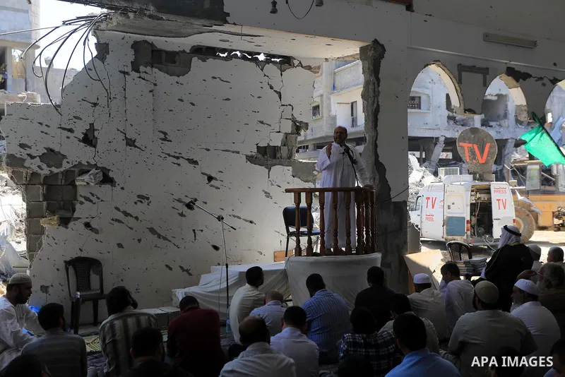 Senior Hamas leader Khalil al-Hayya attends Friday prayers at the remains of a mosque, which witnesses said was hit by an Israeli air strike during a seven-week Israeli offensive in Gaza City August 29, 2014. An open-end...