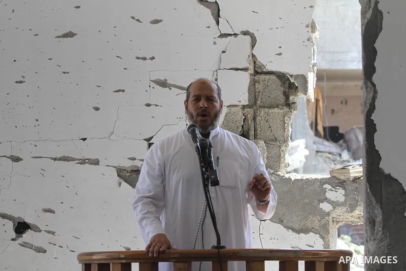 Senior Hamas leader Khalil al-Hayya attends Friday prayers at the remains of a mosque, which witnesses said was hit by an Israeli air strike during a seven-week Israeli offensive in Gaza City August 29, 2014. An open-end...