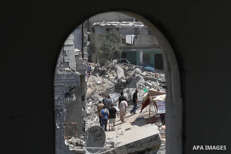 Palestinians perform Friday prayers at the remains of a mosque, which witnesses said was hit by an Israeli air strike during a seven-week Israeli offensive in Gaza City August 29, 2014. An open-ended ceasefire, mediated...
