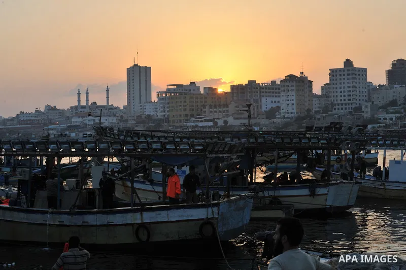 Palestinian fishing boats are moored at Gaza's seaport in Gaza City early on August 29, 2014. Israel and Hamas accepted an Egyptian proposal for a long-term ceasefire in war-torn Gaza on August 26 in a move to end 50 day...