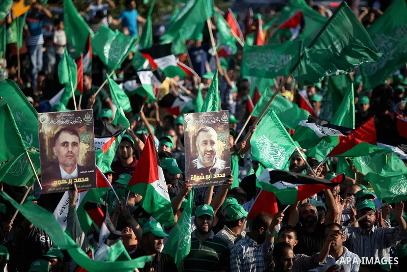 Palestinians who support the Islamic Hamas movement celebrate what they said was a victory by Palestinians in Gaza over Israel following a ceasefire, in the West Bank city of Ramallah August 30, 2014. An open-ended cease...