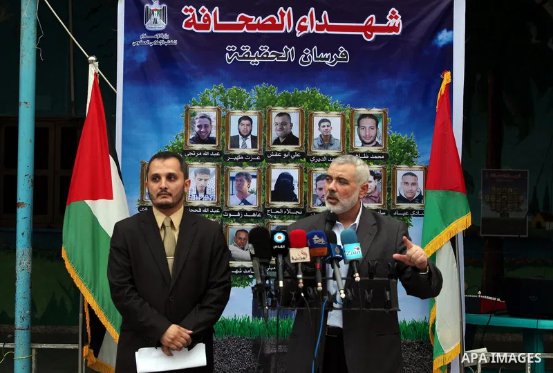 Palestinian top Hamas leader in Gaza, Ismail Haniyeh, speaks during a ceremony honoring to Journalists's families in Gaza city on 30 August 2014. An indefinite ceasefire to end seven weeks of fighting between Israel and...